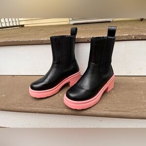 Black and funky pink platform waterproof boots